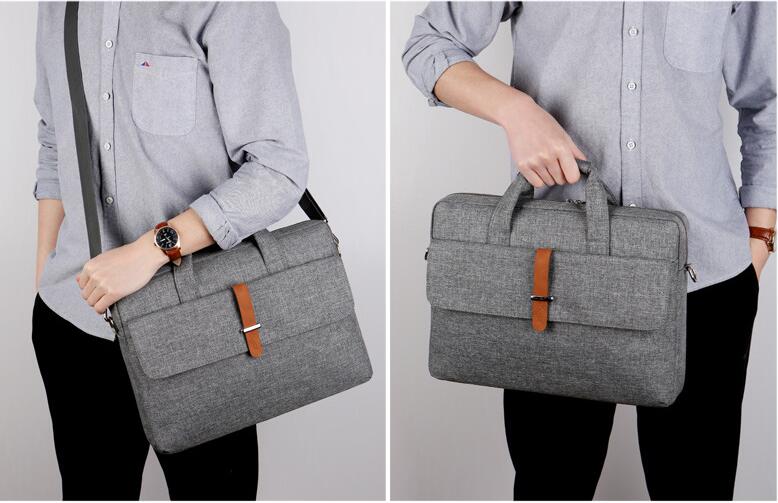 model show of grey portable computer shoulder bag